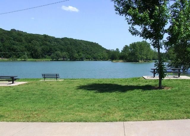 Bella Vista Lake Trail Image of lake with lawn and trees